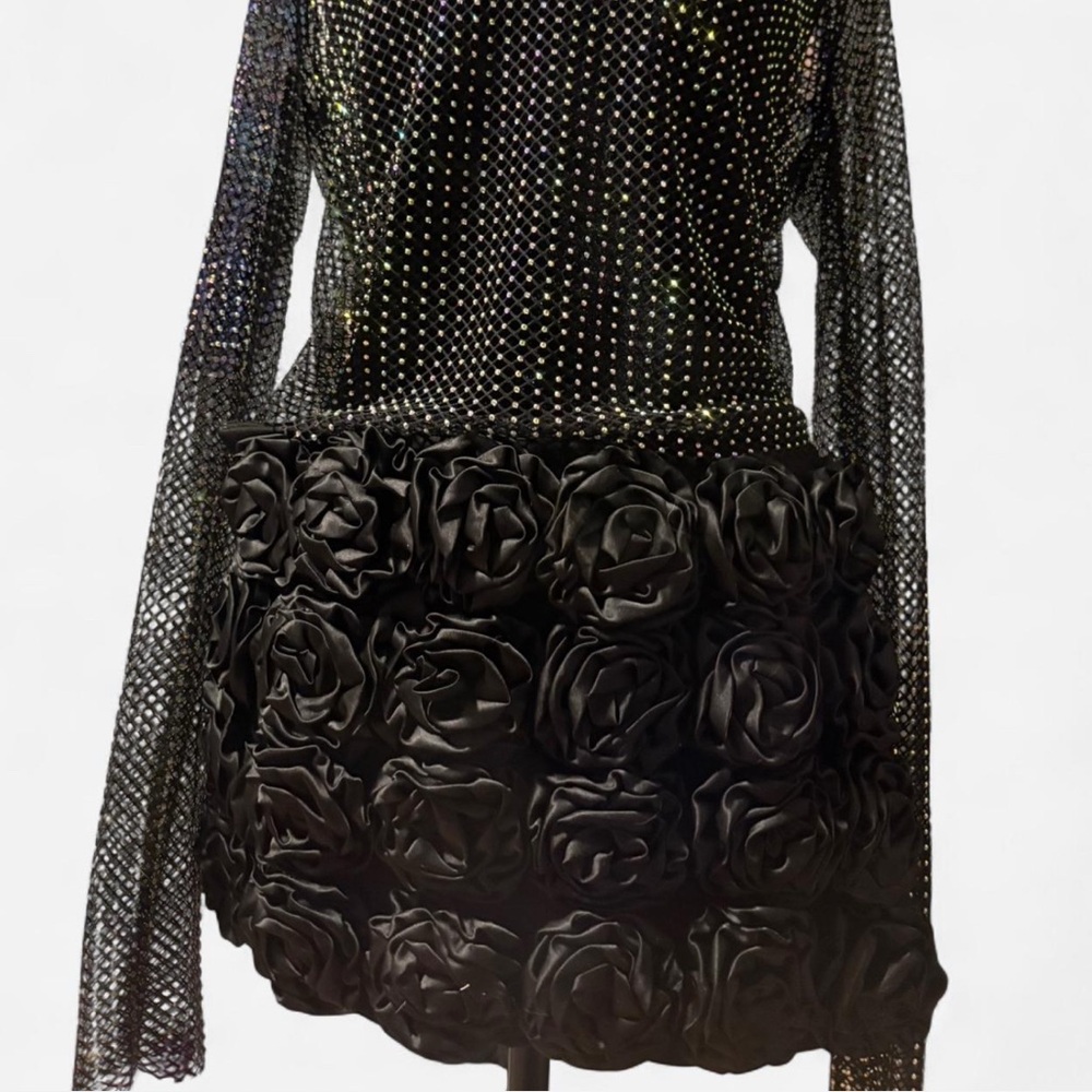 Black rose ruffle skirt
New with tags!